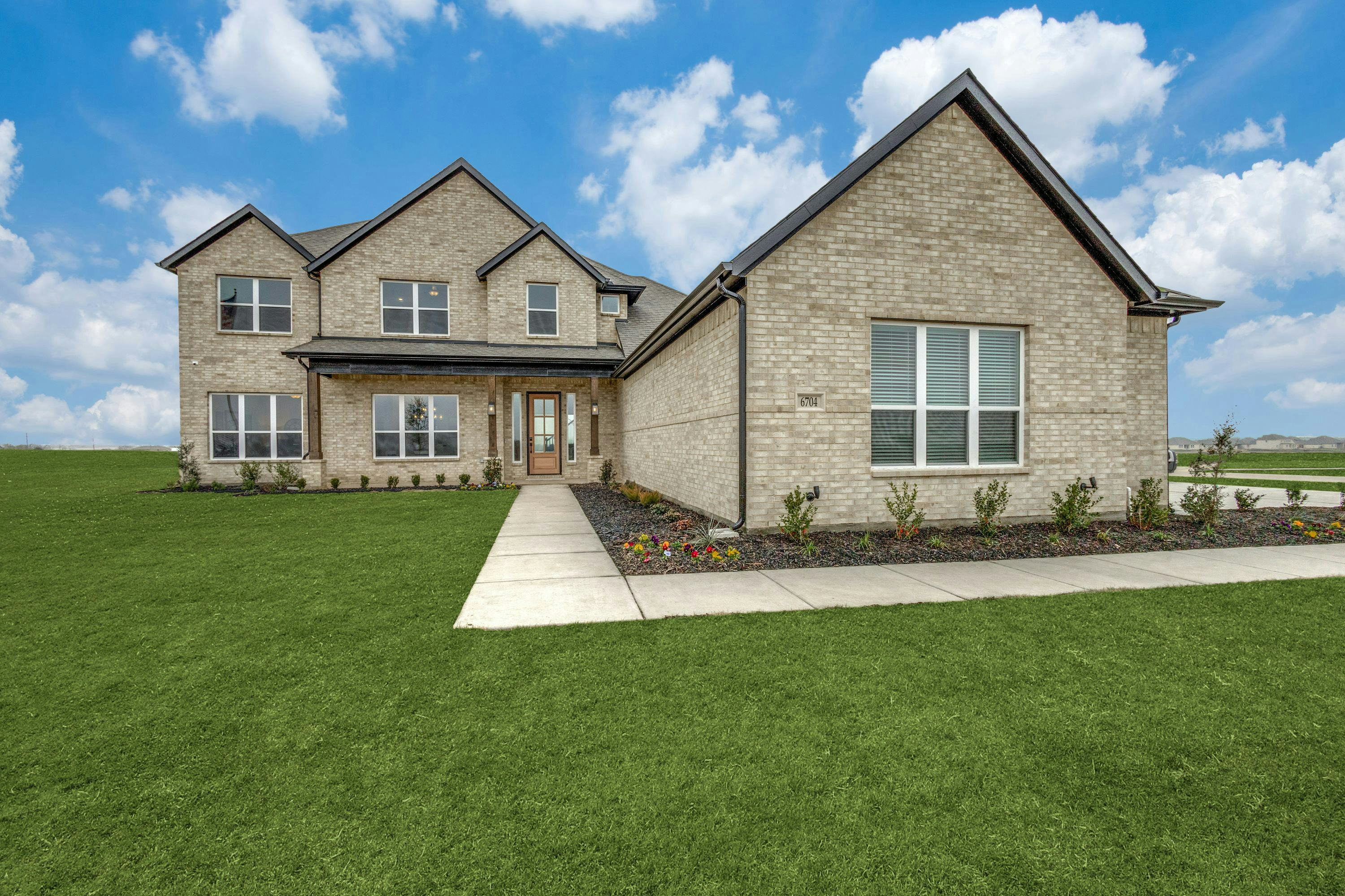 Front of Berkshire Estates home in Mesquite, TX by Kindred Homes