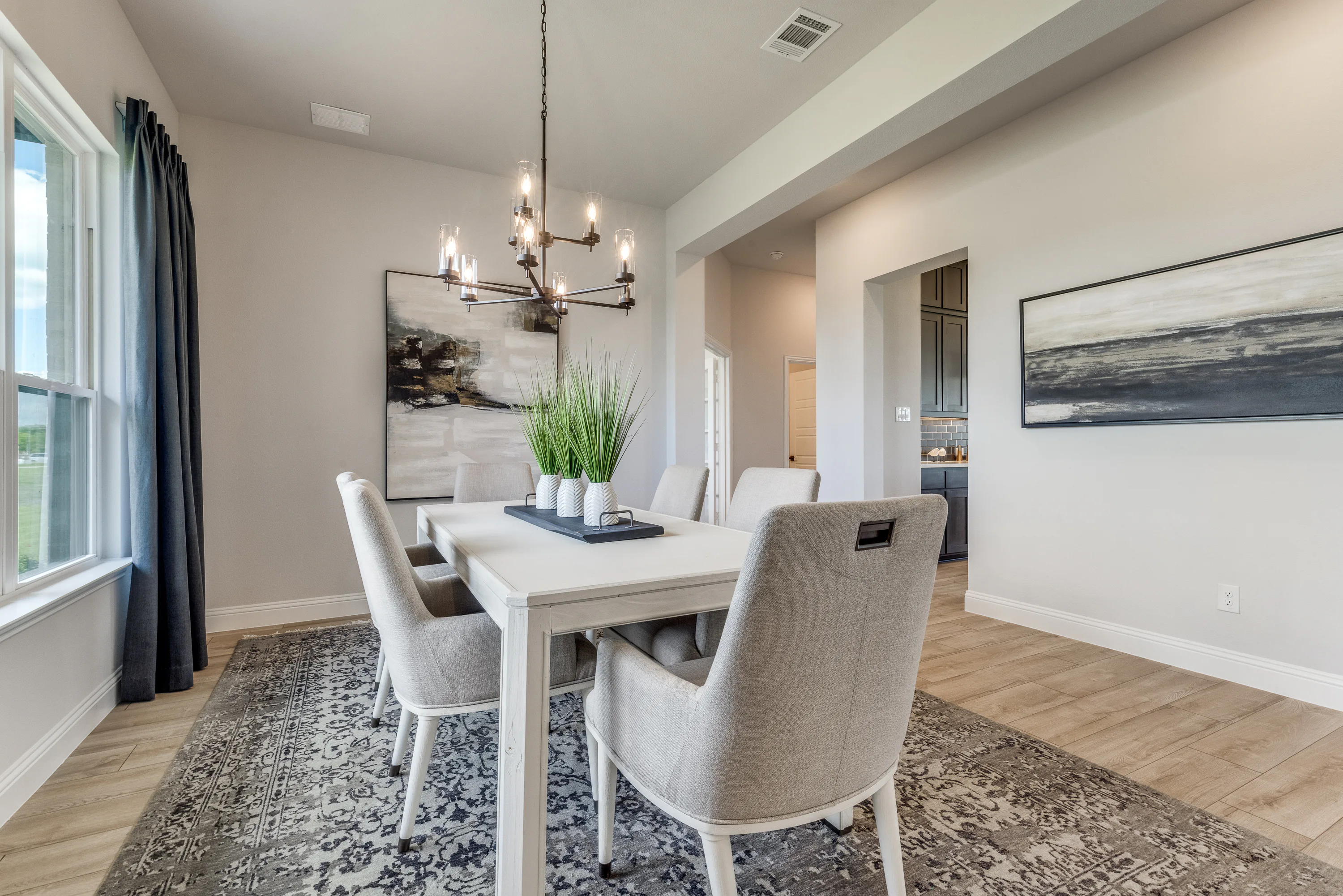 Window of dining room inside Berkshire Estates home in Mesquite, TX by Kindred Homes