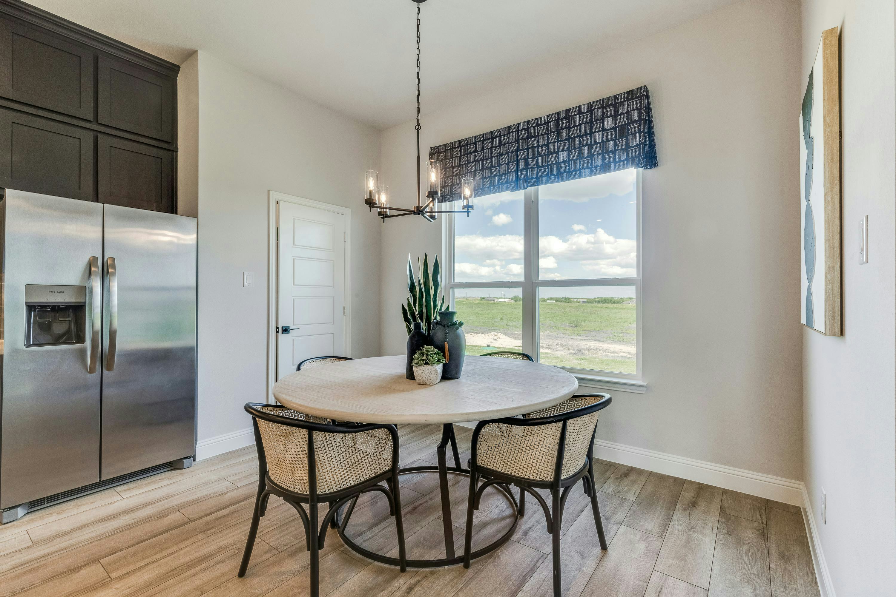 Dining room of Berkshire Estates home in Mesquite, TX by Kindred Homes