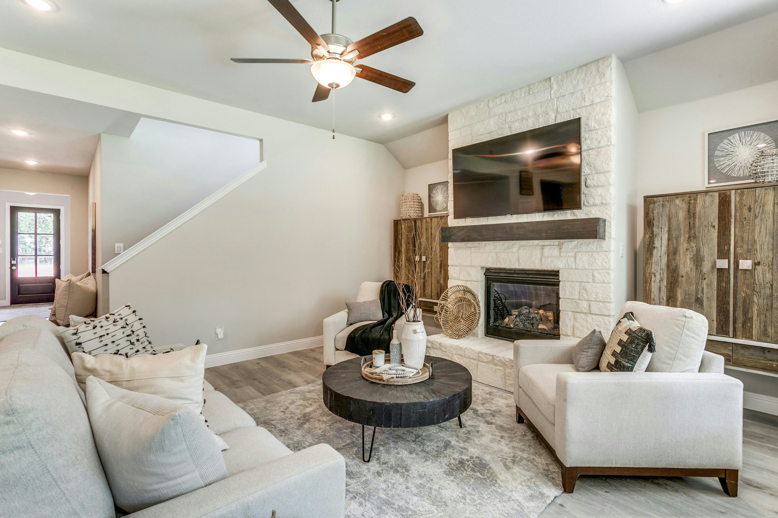 Living room of Stone Eagle home in Azle, TX by Kindred Homes
