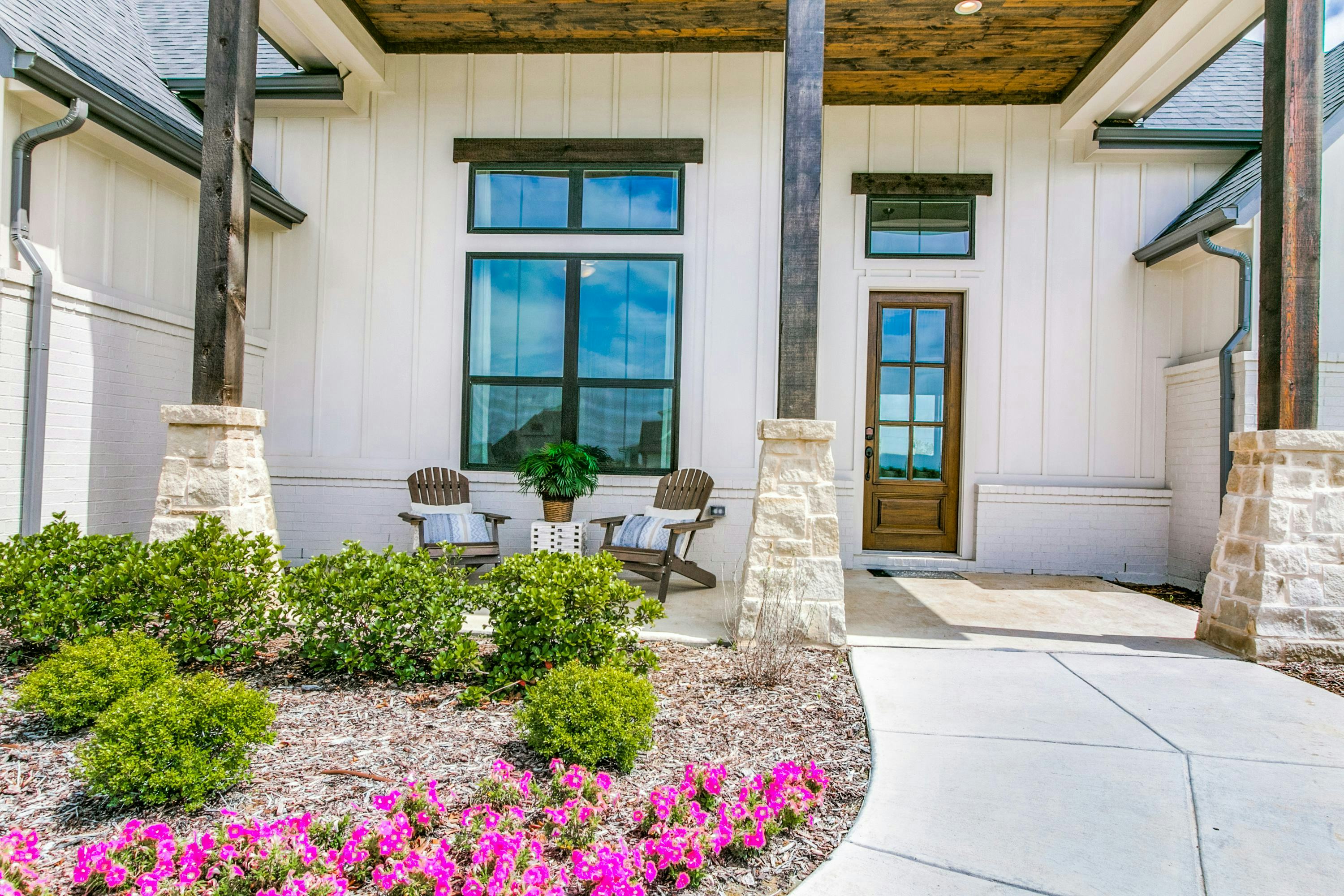 Front porch of The Highlands of Northlake home in Northlake, TX by Kindred Homes