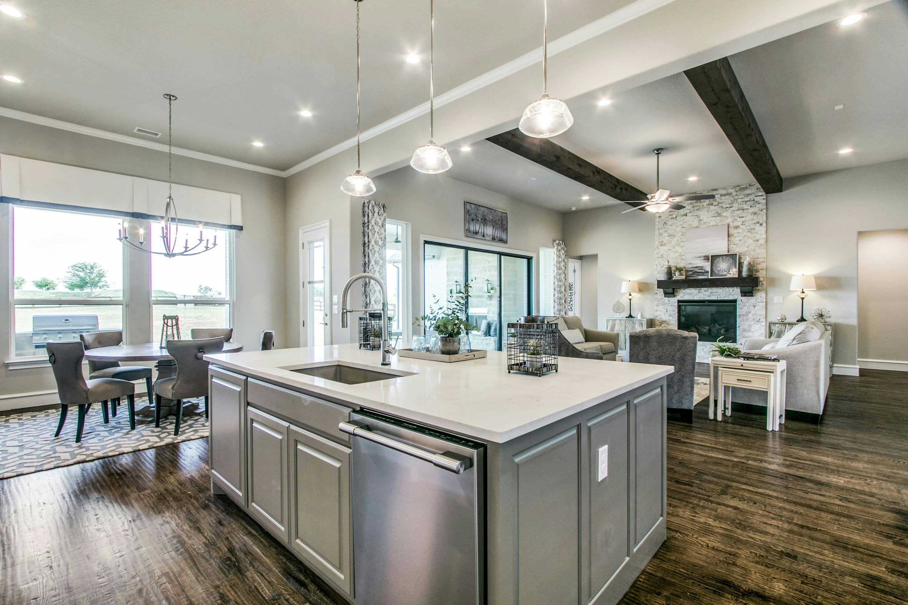 Kitchen and dining room of The Highlands of Northlake home in Northlake, TX by Kindred Homes