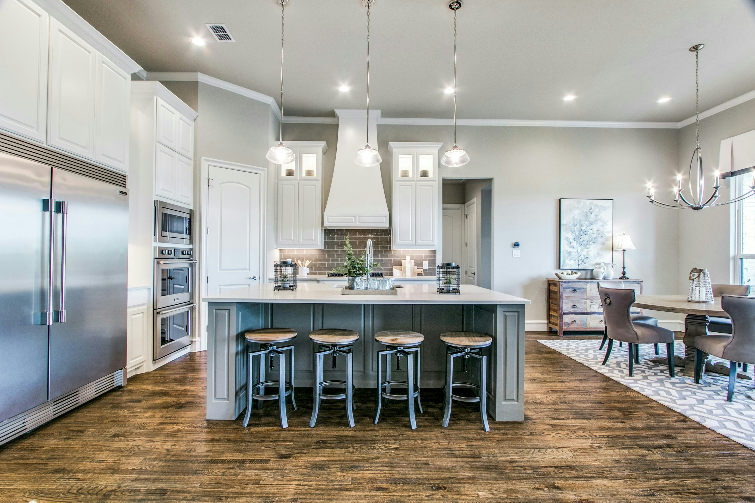 Kitchen and pantry of The Highlands of Northlake home in Northlake, TX by Kindred Homes
