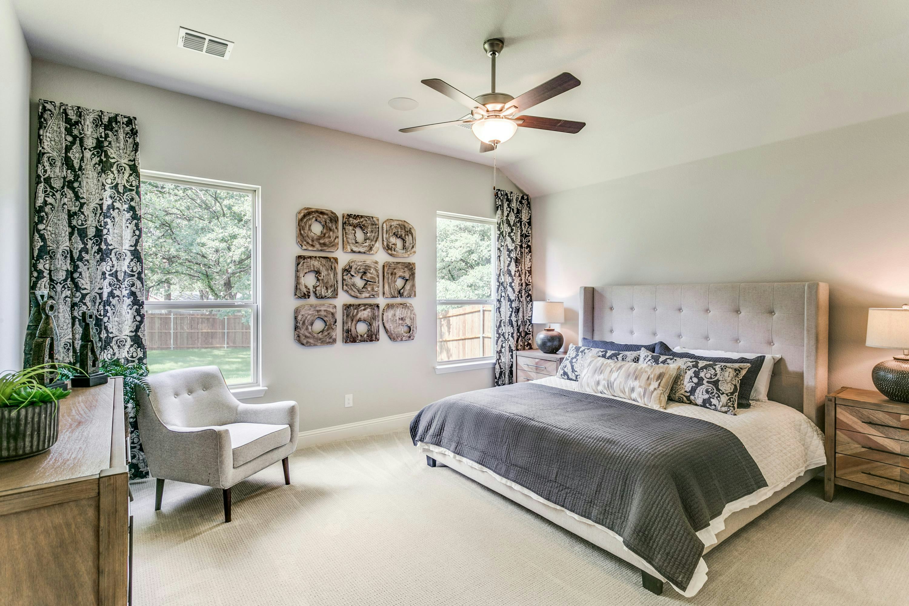 Primary bedroom of Stone Eagle home in Azle, TX by Kindred Homes
