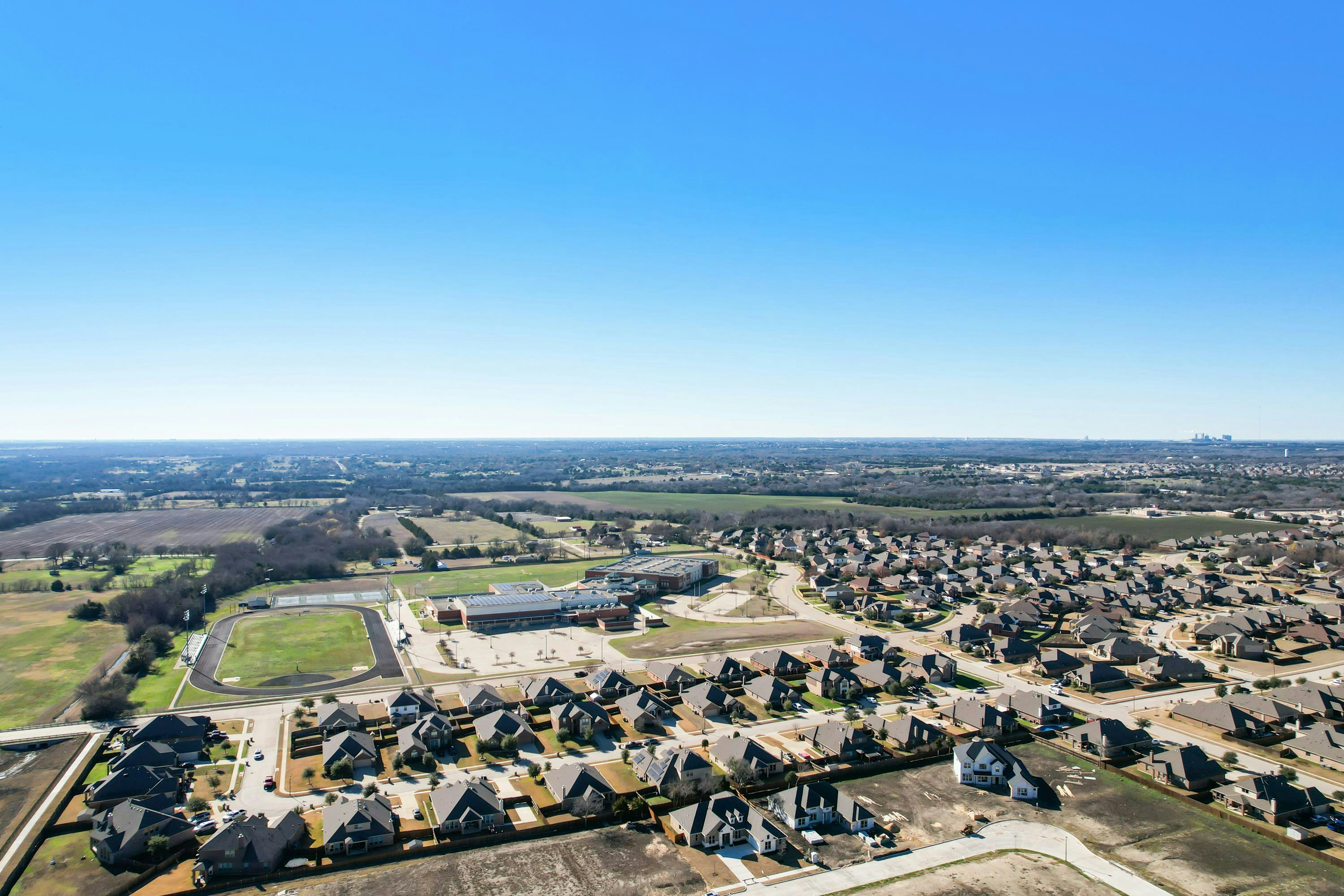Aerial of Kentsdale Farms community in DeSoto, TX by Kindred Homes