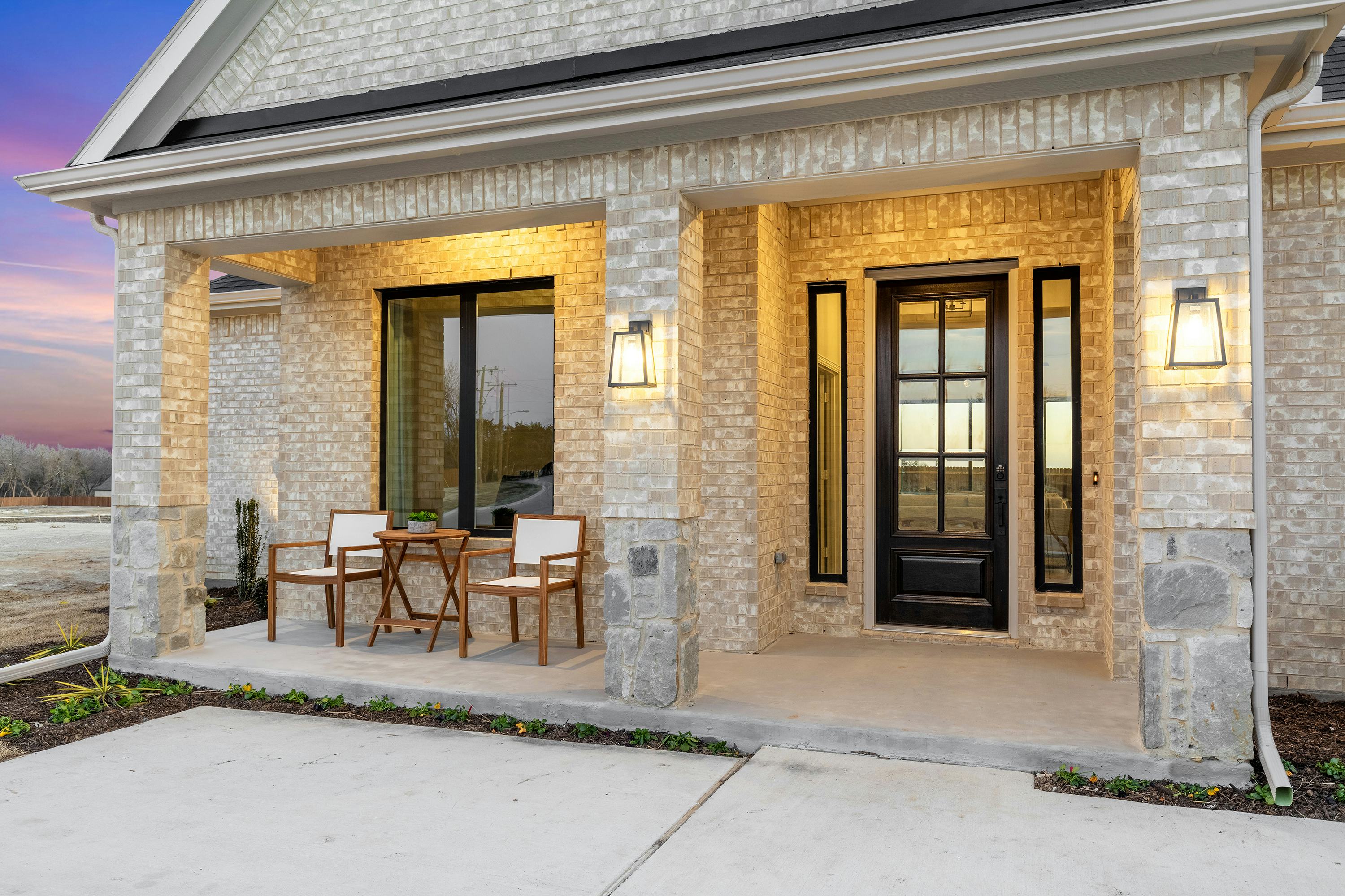 Front porch of Kentsdale Farms home in DeSoto, TX by Kindred Homes