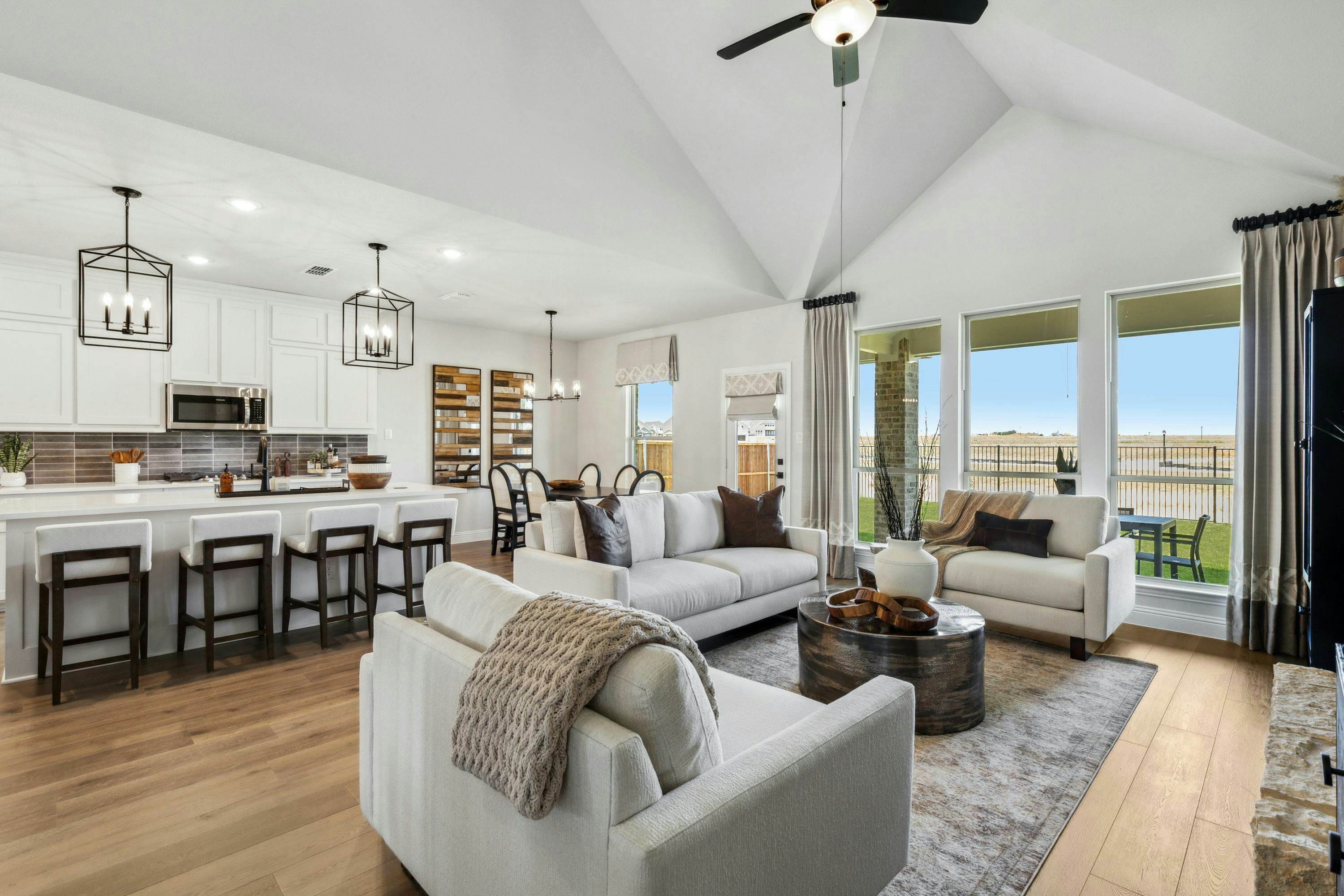 Westside Preserve home living room and kitchen in Midlothian, TX by Kindred Homes