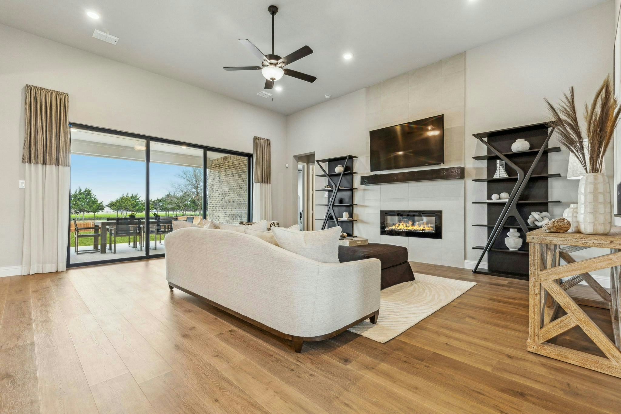 Side view of Hampton Park Estates living room in Glenn Heights, TX by Kindred Homes