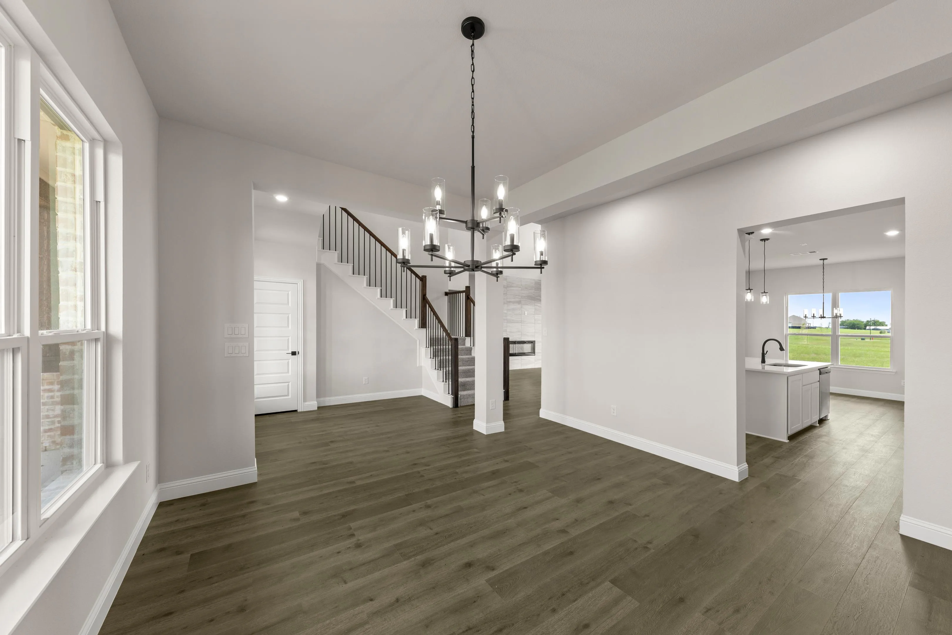Formal dining room in a new traditional style home by Kindred Homes