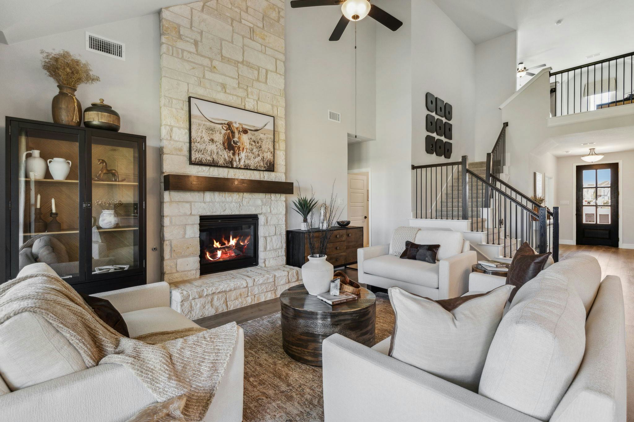 Westside Preserve home living room and staircase in Midlothian, TX by Kindred Homes