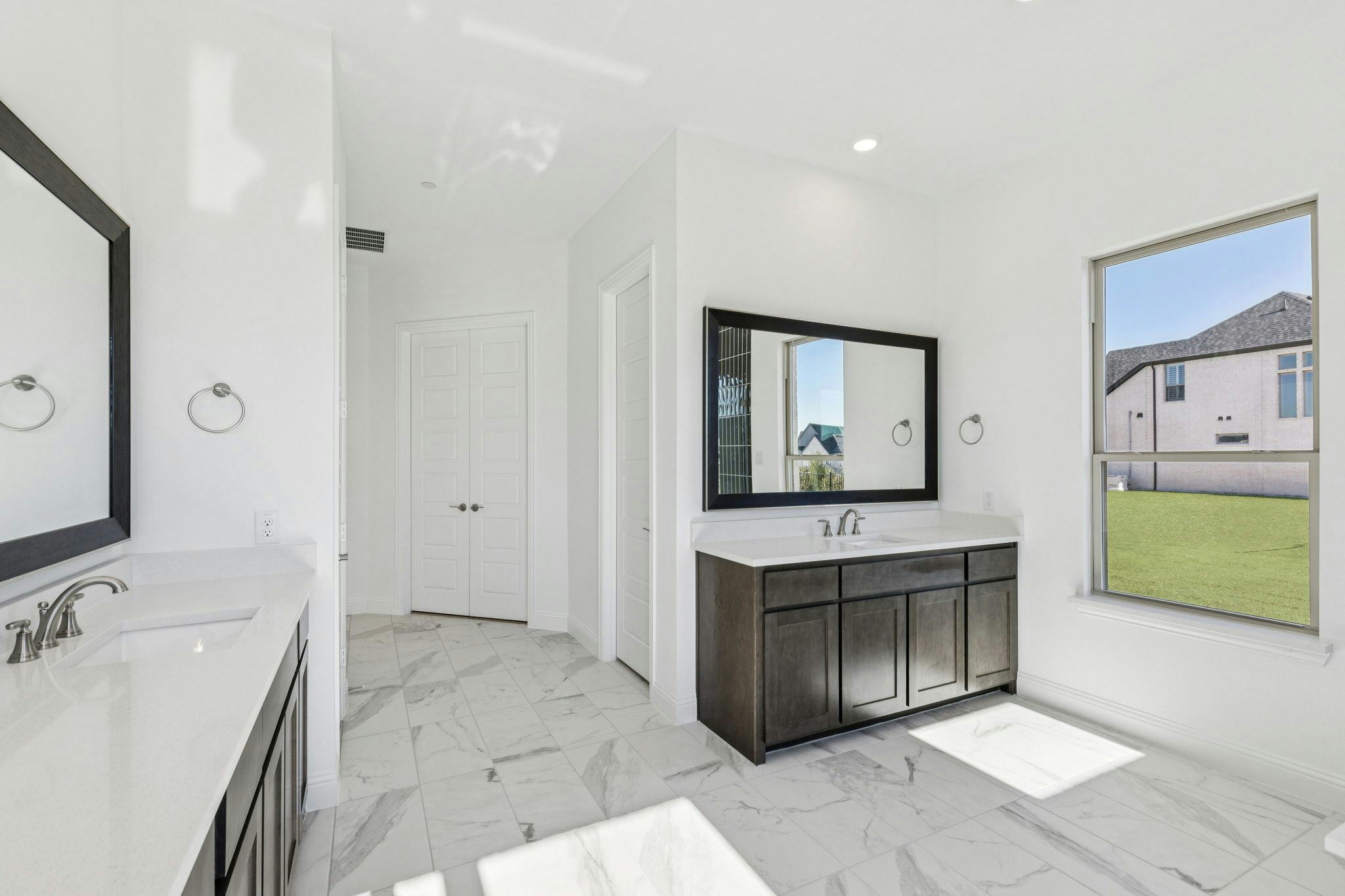 Primary bathroom in the Franklin floor plan by Kindred Homes