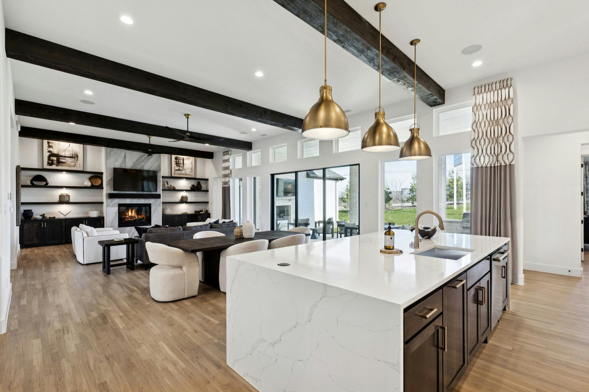 The kitchen in the custom model home at The Vines by Kindred Homes