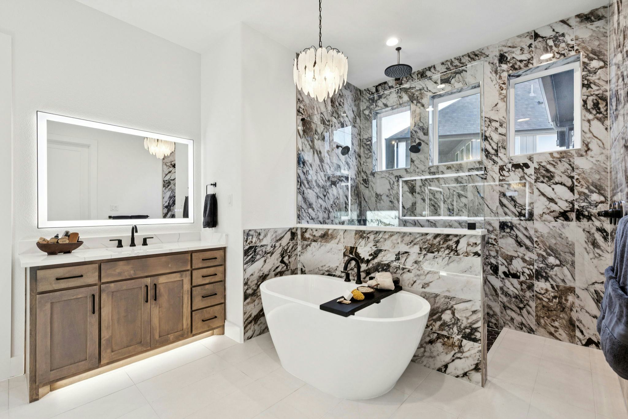 The primary suite bathroom in the custom model home at The Vines by Kindred Homes