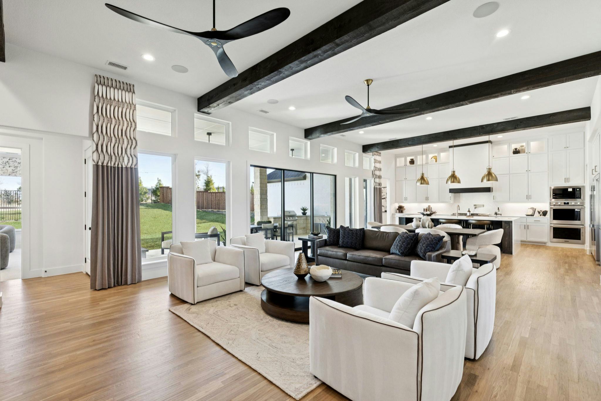 The open concept living area in the custom model home at The Vines by Kindred Homes