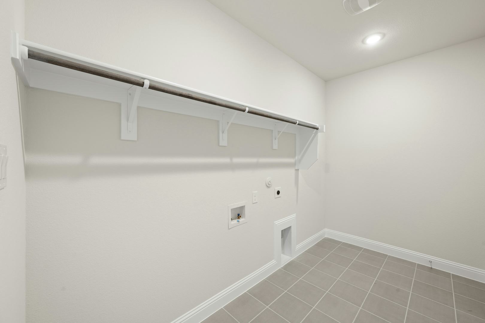 The utility closet in the Willow floor plan by Kindred Homes