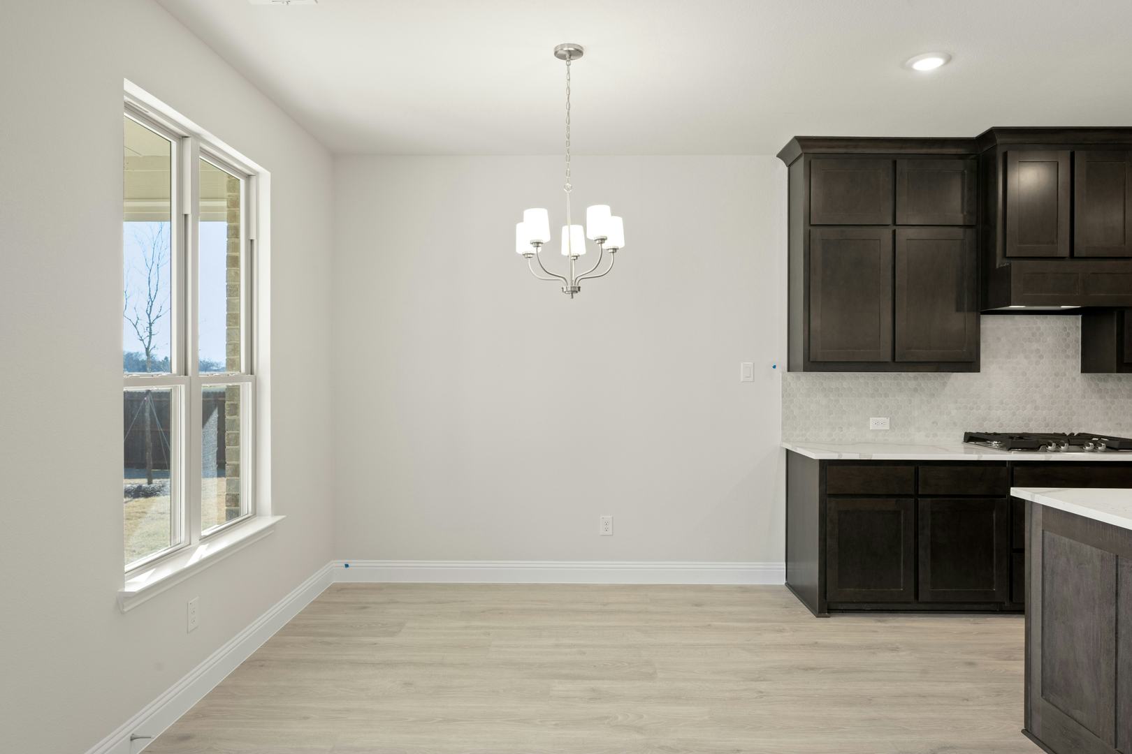 The dining nook in the Willow floor plan by Kindred Homes
