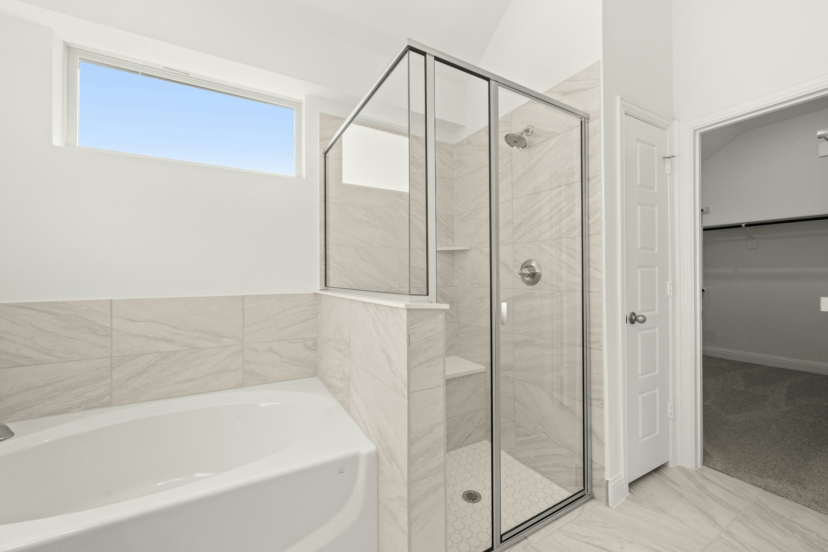 The primary bathroom in the Cherry floor plan by Kindred Homes