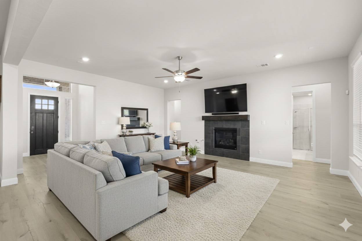 Virtually staged living room in the Brady floor plan at Heritage by Kindred Homes