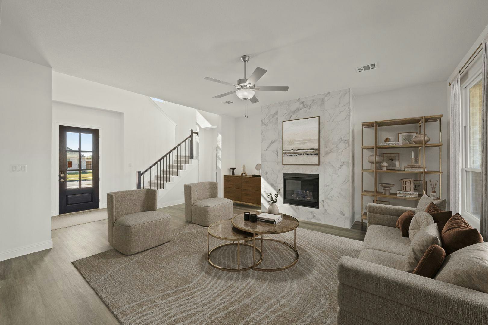 Virtually staged living room in the Villa floor plan at Kentsdale Farms by Kindred Homes