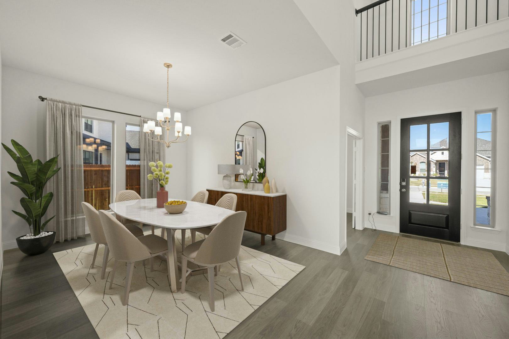 Virtually staged dining room in the Manor floor plan at Kentsdale Farms by Kindred Homes