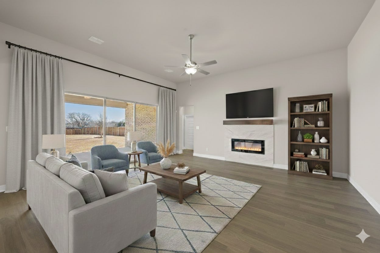 Virtually staged living room at the Reid floorplan in Hampton Park Estates by Kindred Homes.