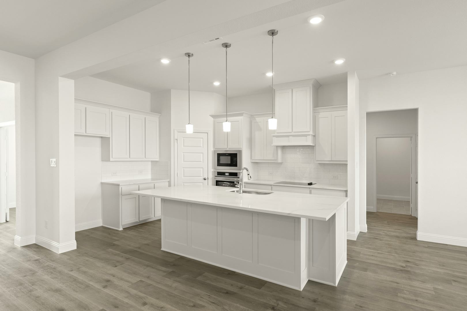 The kitchen of the Brady floor plan at Berkshire Estates by Kindred Homes