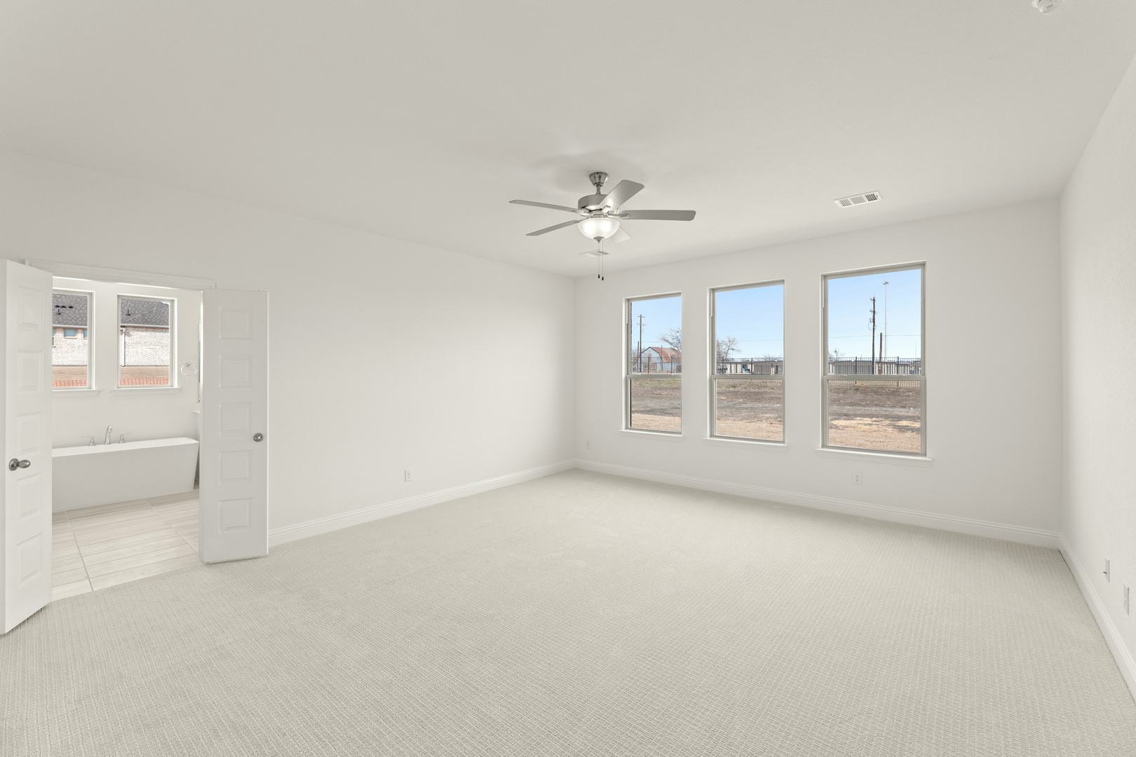 The primary bedroom of the Brady floor plan at Berkshire Estates by Kindred Homes