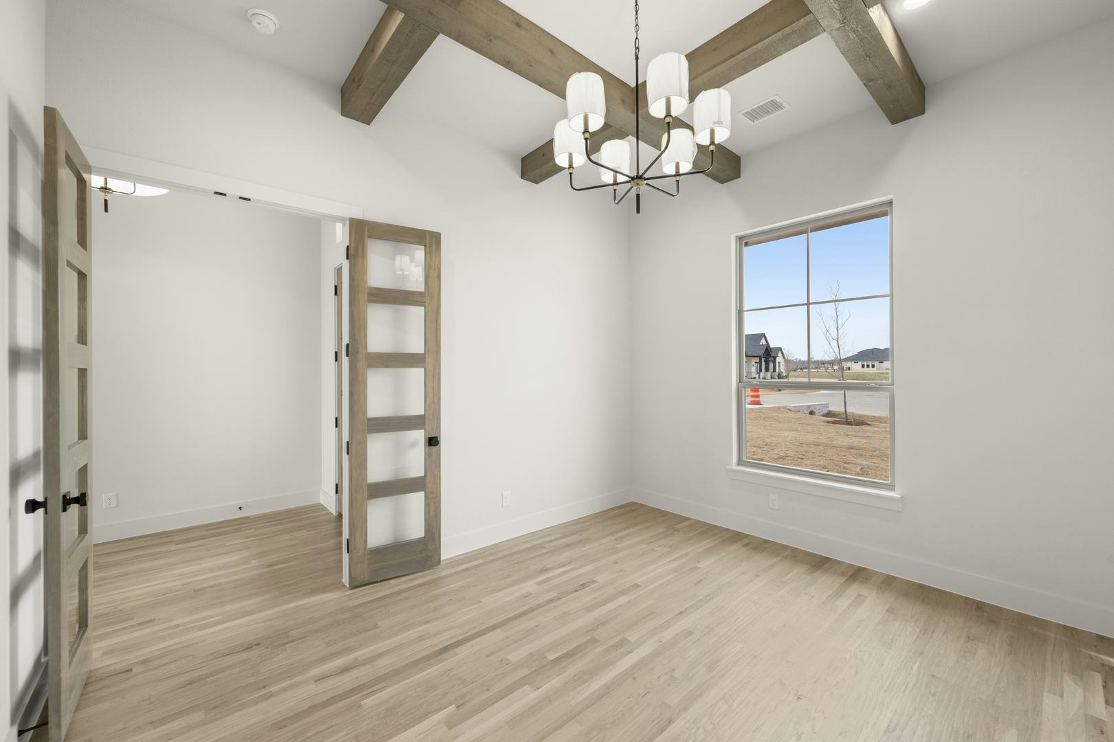 Study in a custom home at Highlands of Northlake by Kindred Homes