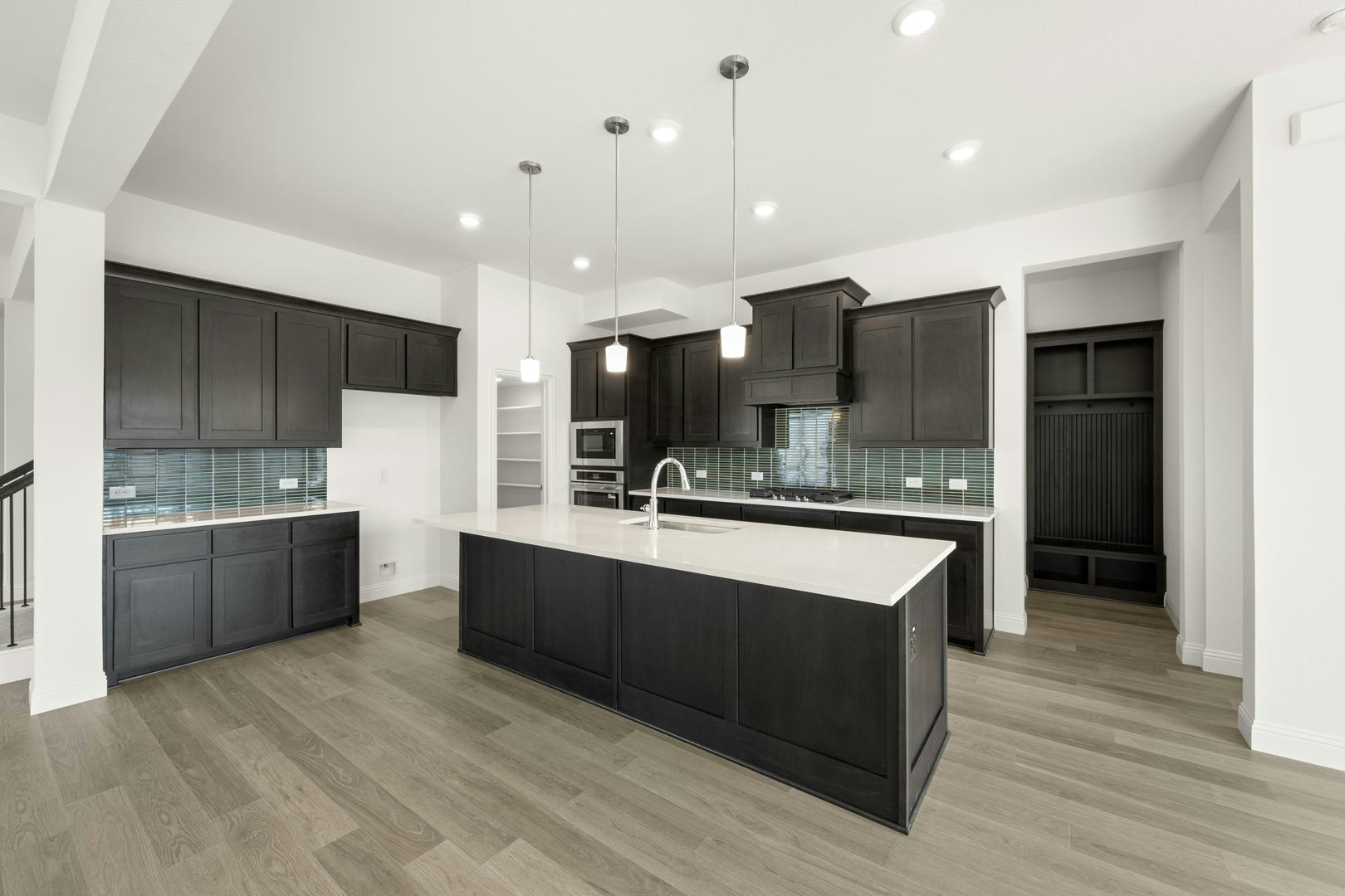 Kitchen in the Cherry floor plan at Stone Eagle by Kindred Homes