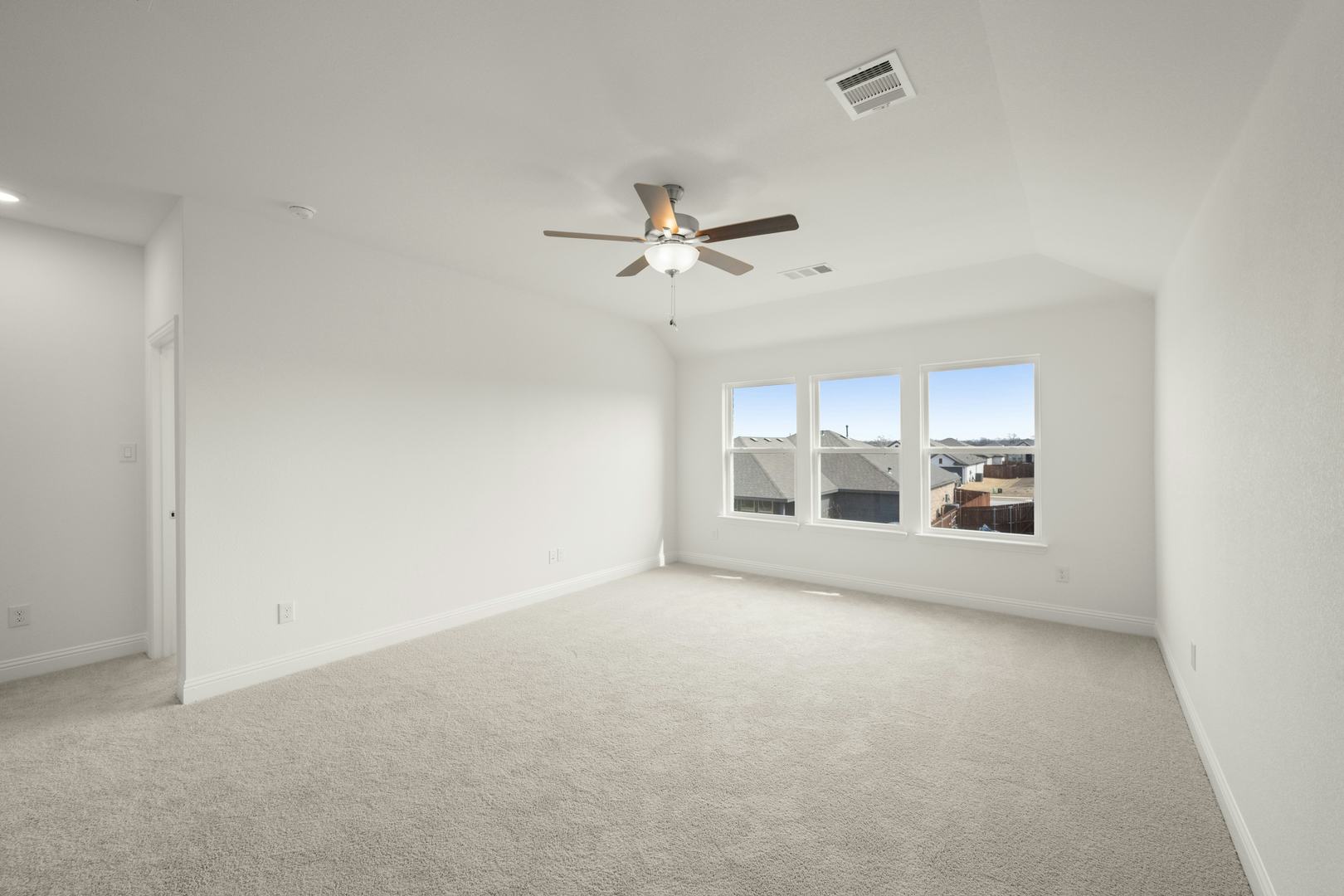 Game room in the Cherry floor plan at Stone Eagle by Kindred Homes