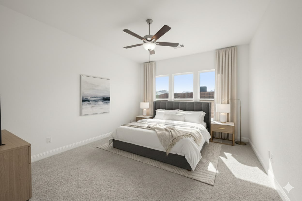 Virtually staged primary bedroom in the Cherry floor plan at Stone Eagle by Kindred Home