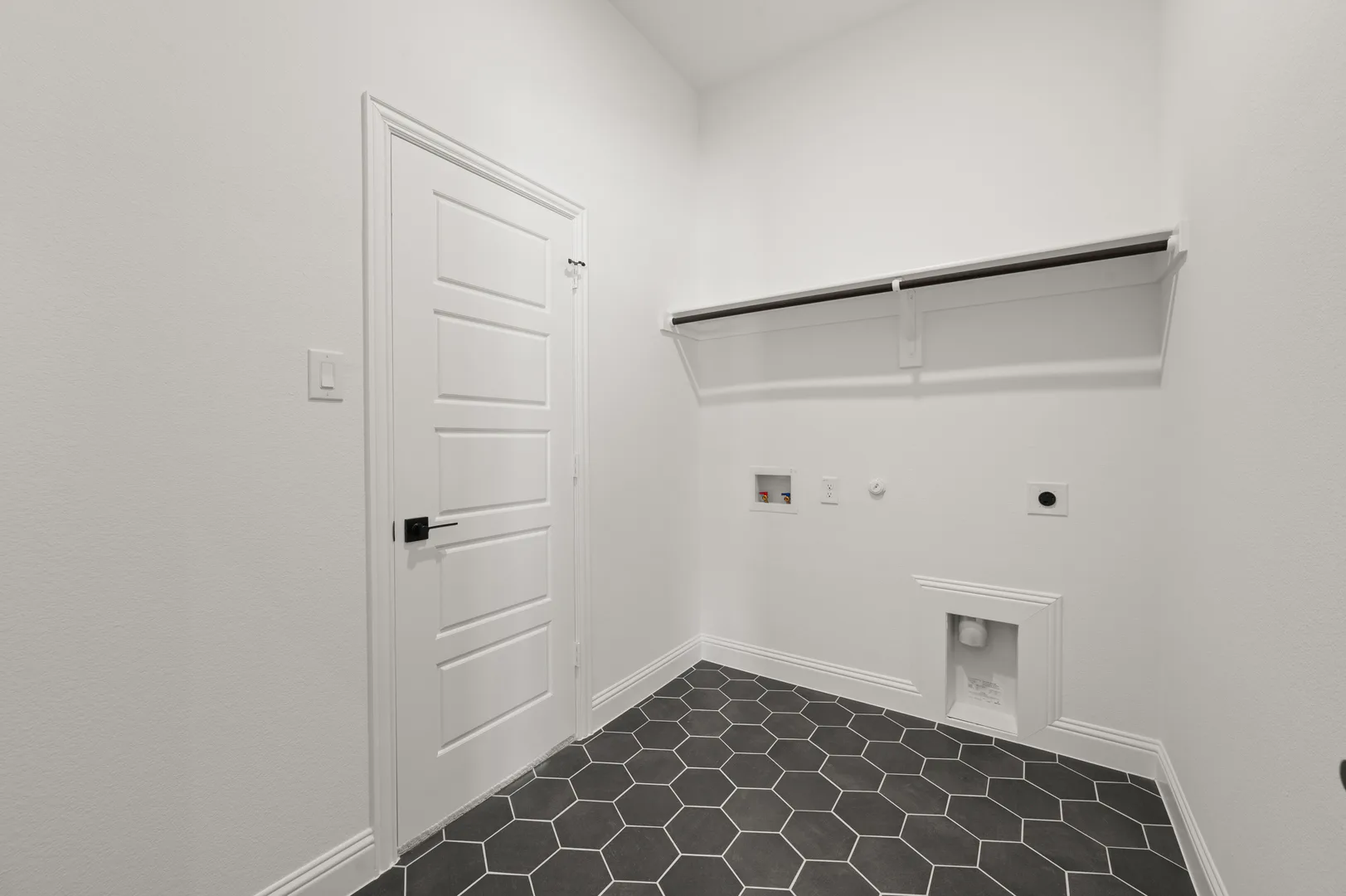 Utility room in available home at Westside Preserve by Kindred Homes in Midlothian