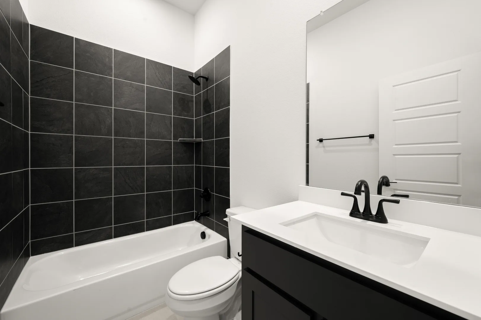 Secondary bathroom with bathtub in available home at Westside Preserve by Kindred Homes in Midlothian