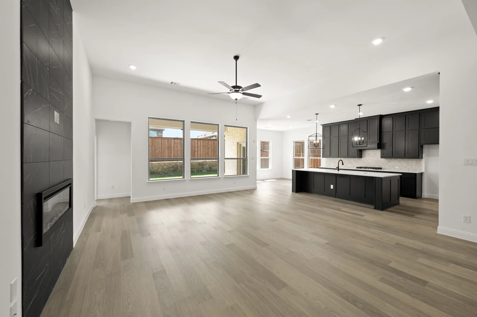 Open concept living room and kitchen in available home at Westside Preserve by Kindred Homes in Midlothian
