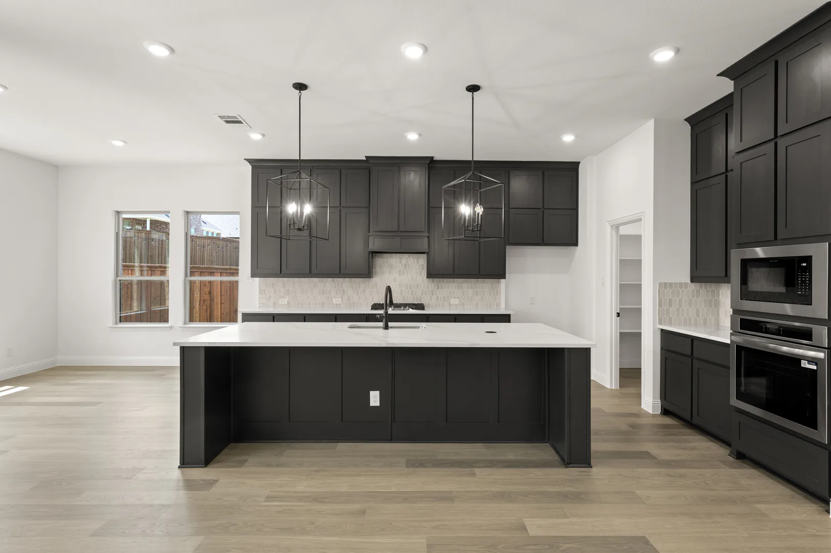 Kitchen and dining nook in available home at Westside Preserve by Kindred Homes in Midlothian