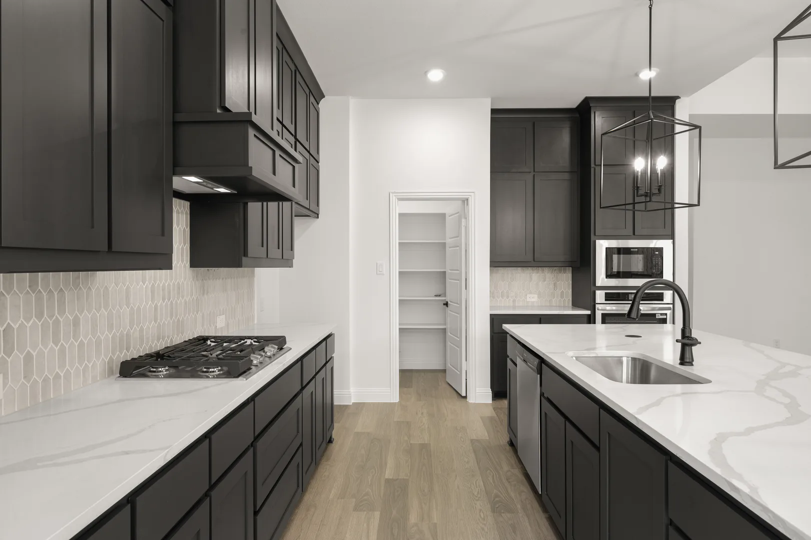 Kitchen with sleek appliances in available home at Westside Preserve by Kindred Homes in Midlothian