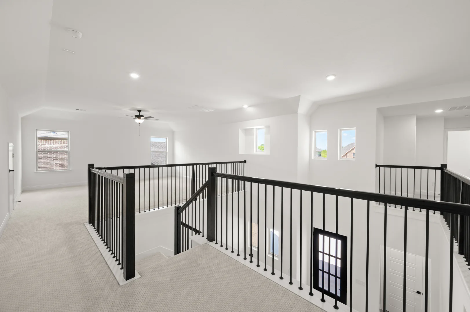Landing and game room in available home at Westside Preserve by Kindred Homes in Midlothian