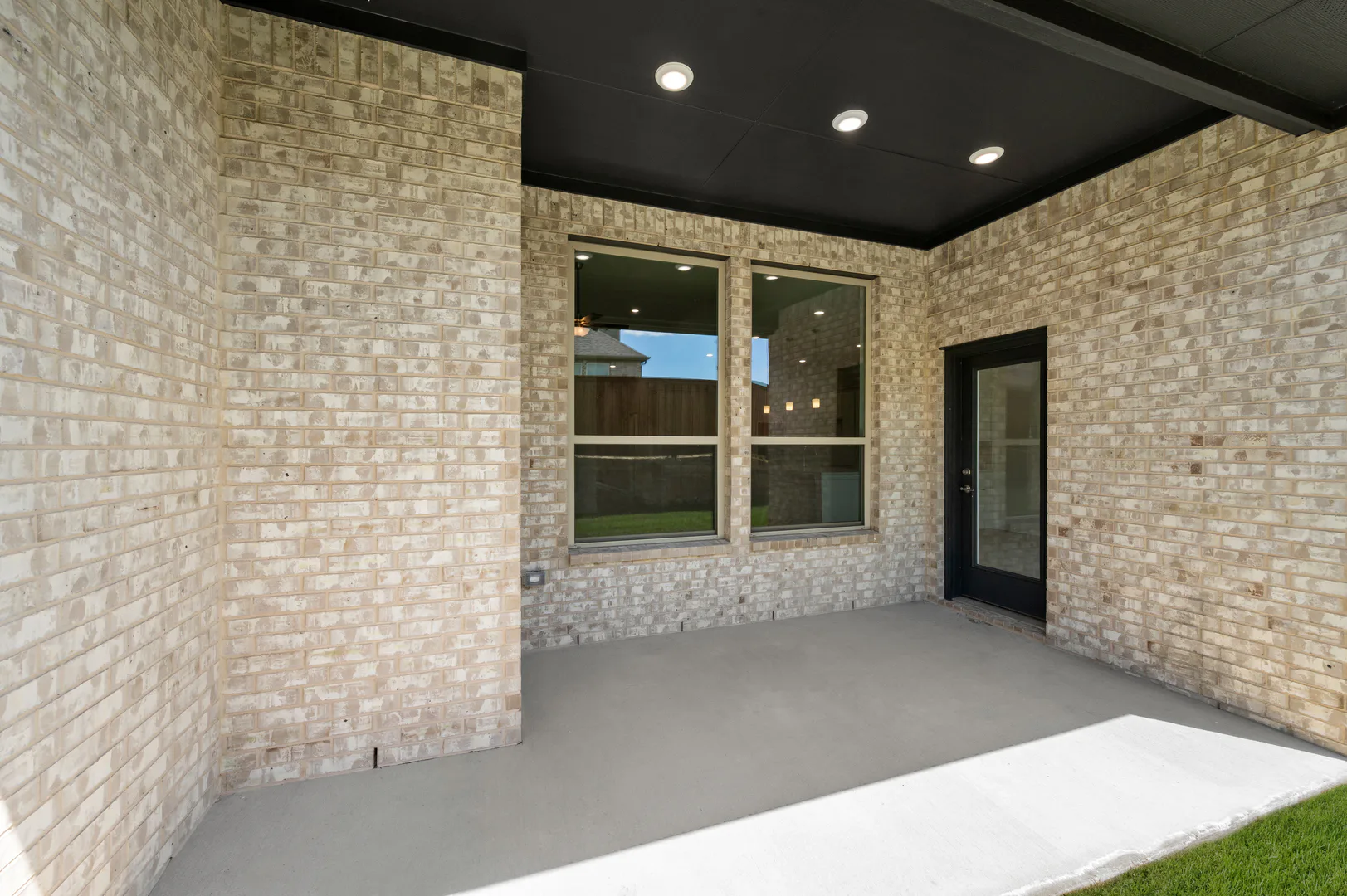 Covered patio of available home at Westside Preserve by Kindred Homes in Midlothian
