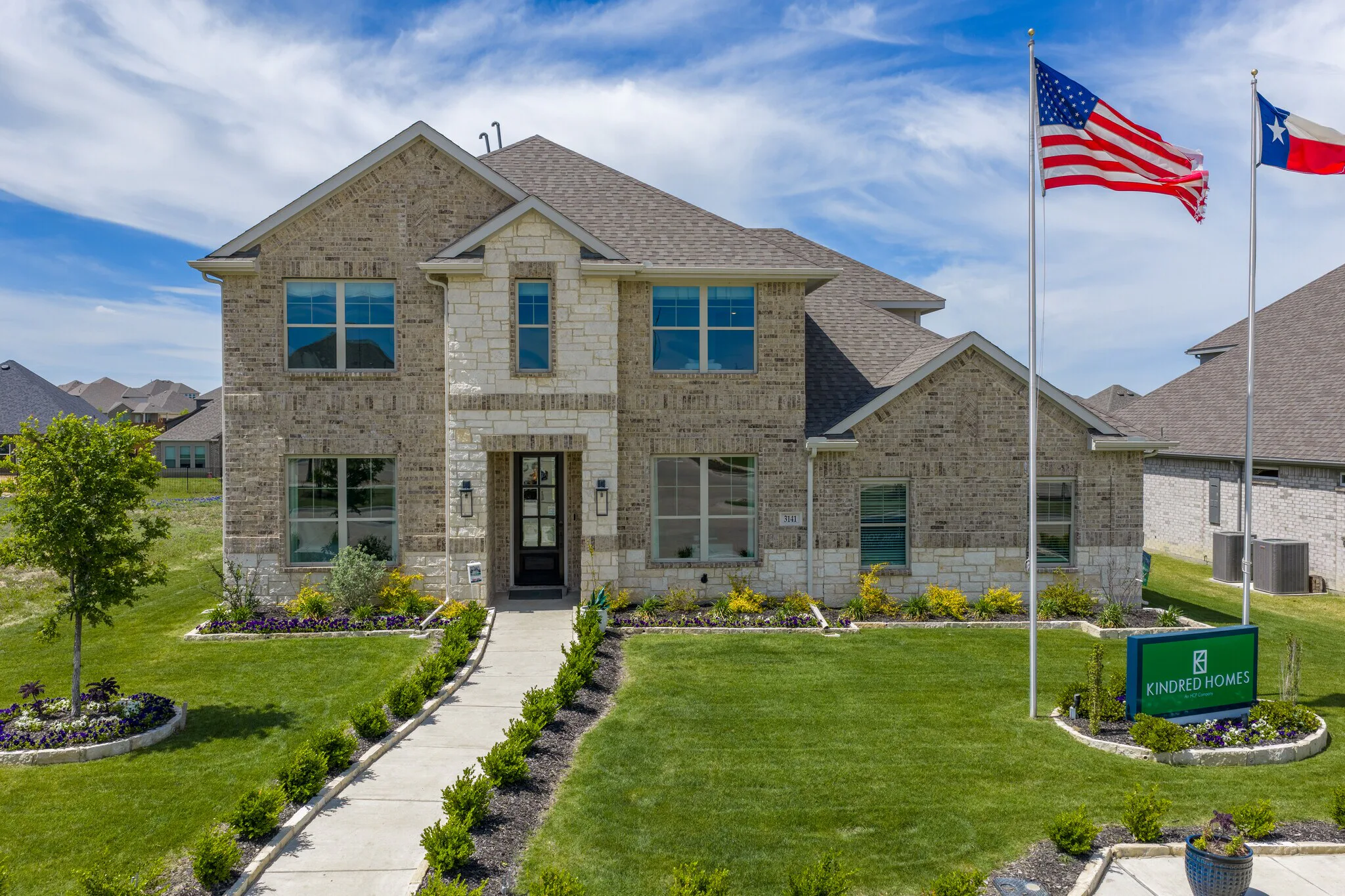 Exterior photo of Model Home in Westside Preserve by Kindred Homes