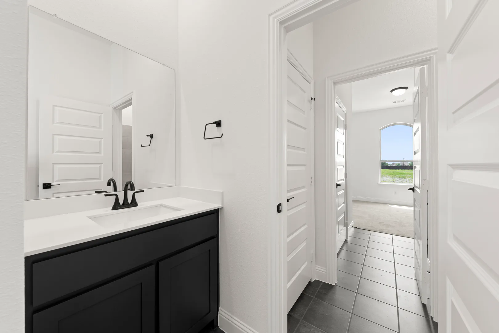 Secondary bathroom in available home at Park Trails by Kindred Homes in Forney