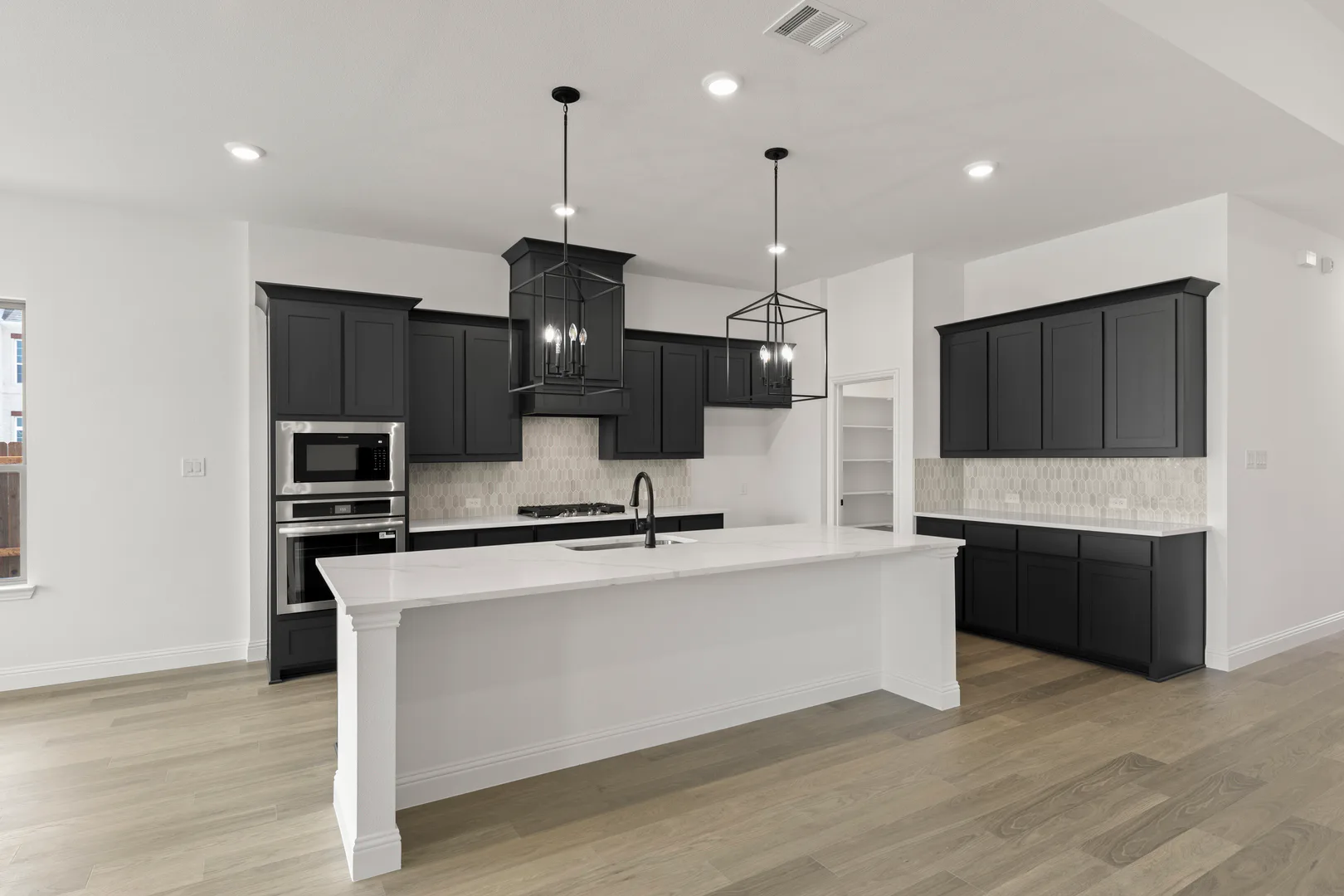 Kitchen in available home at Park Trails by Kindred Homes in Forney