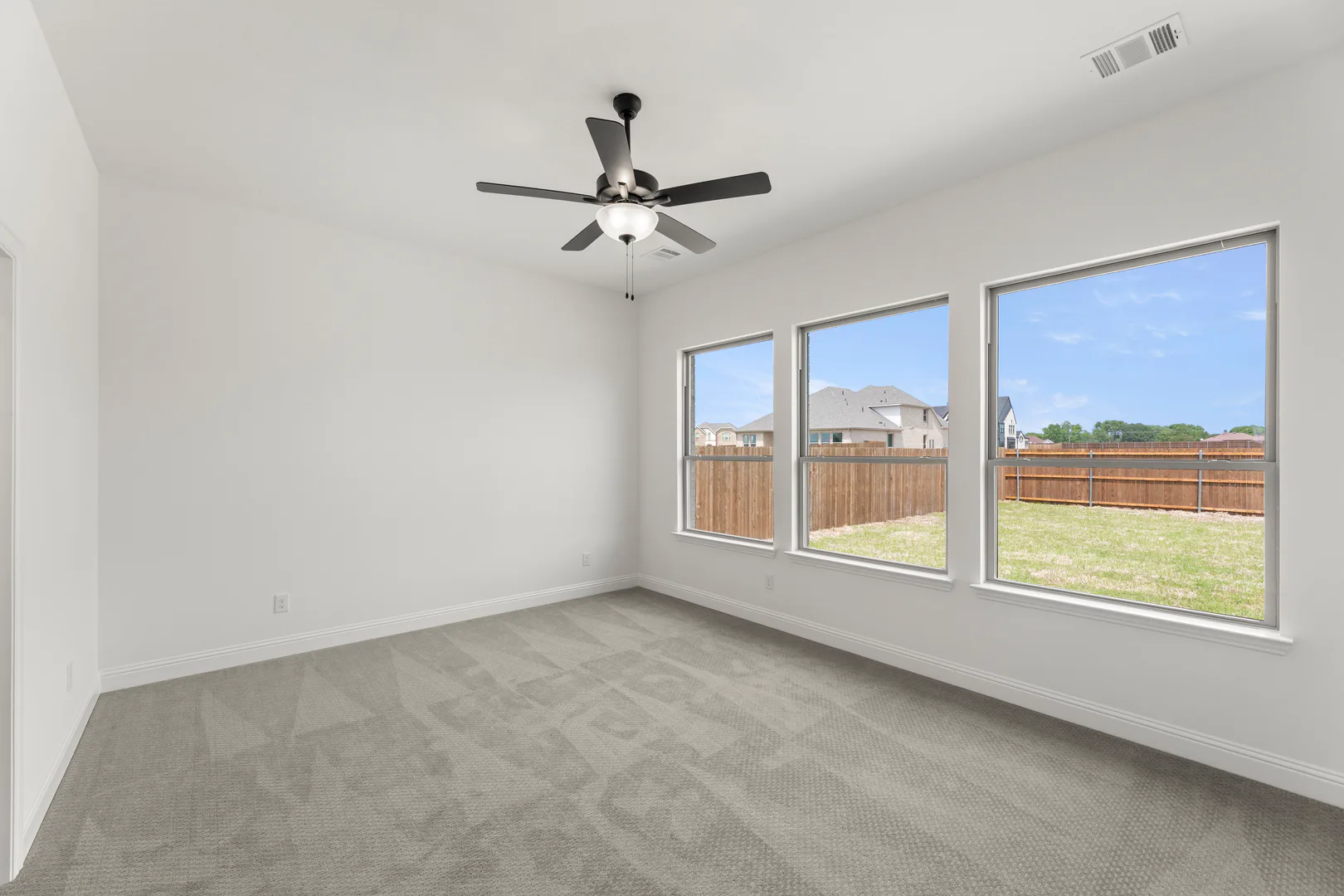Primary bedroom in available home at Park Trails by Kindred Homes in Forney