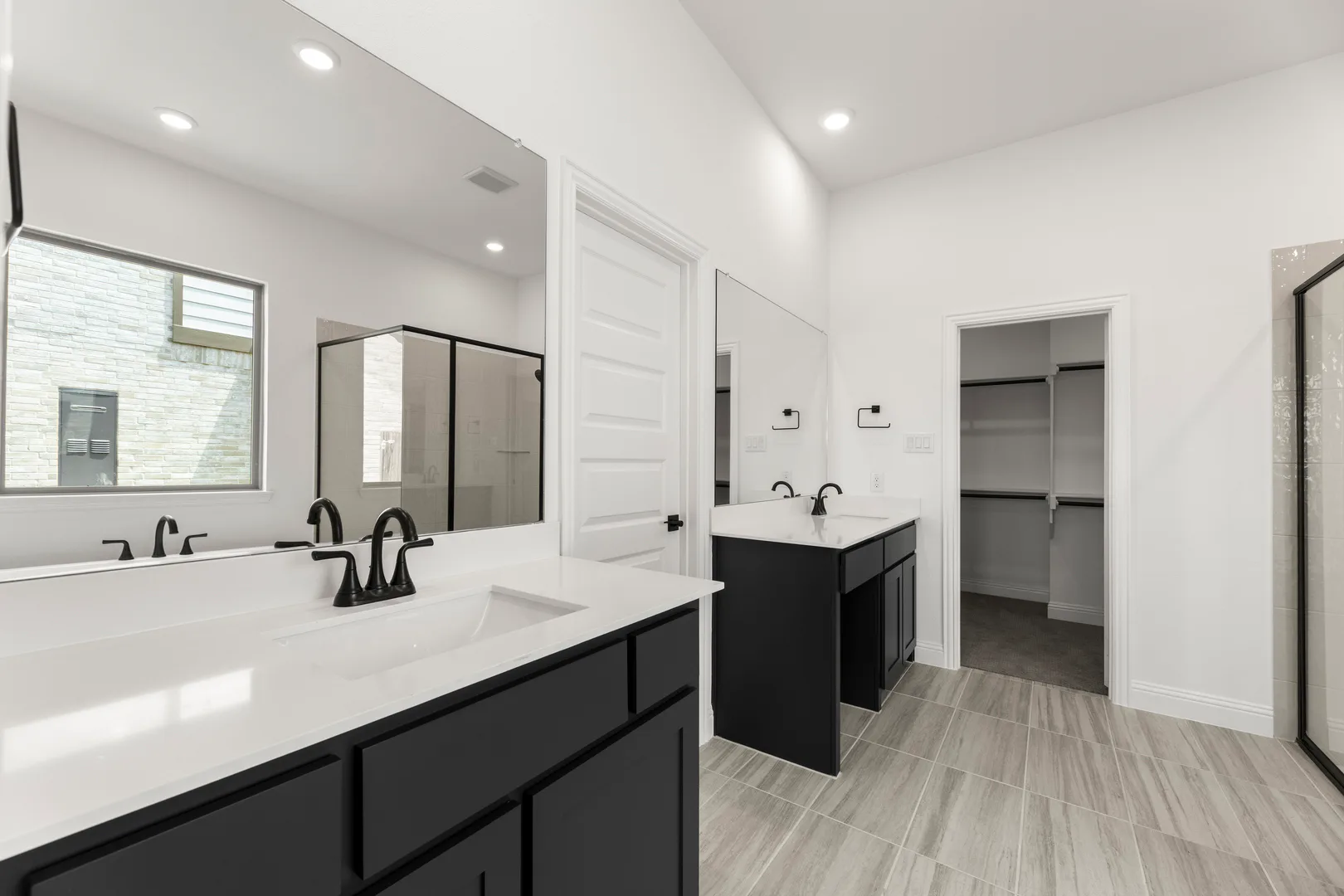Primary bathroom in available home at Park Trails by Kindred Homes in Forney
