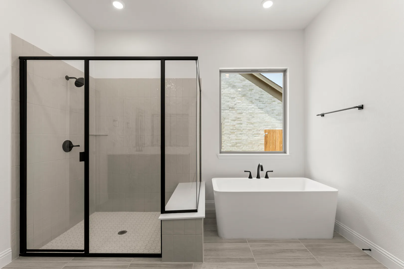 Primary bathroom in available home at Park Trails by Kindred Homes in Forney