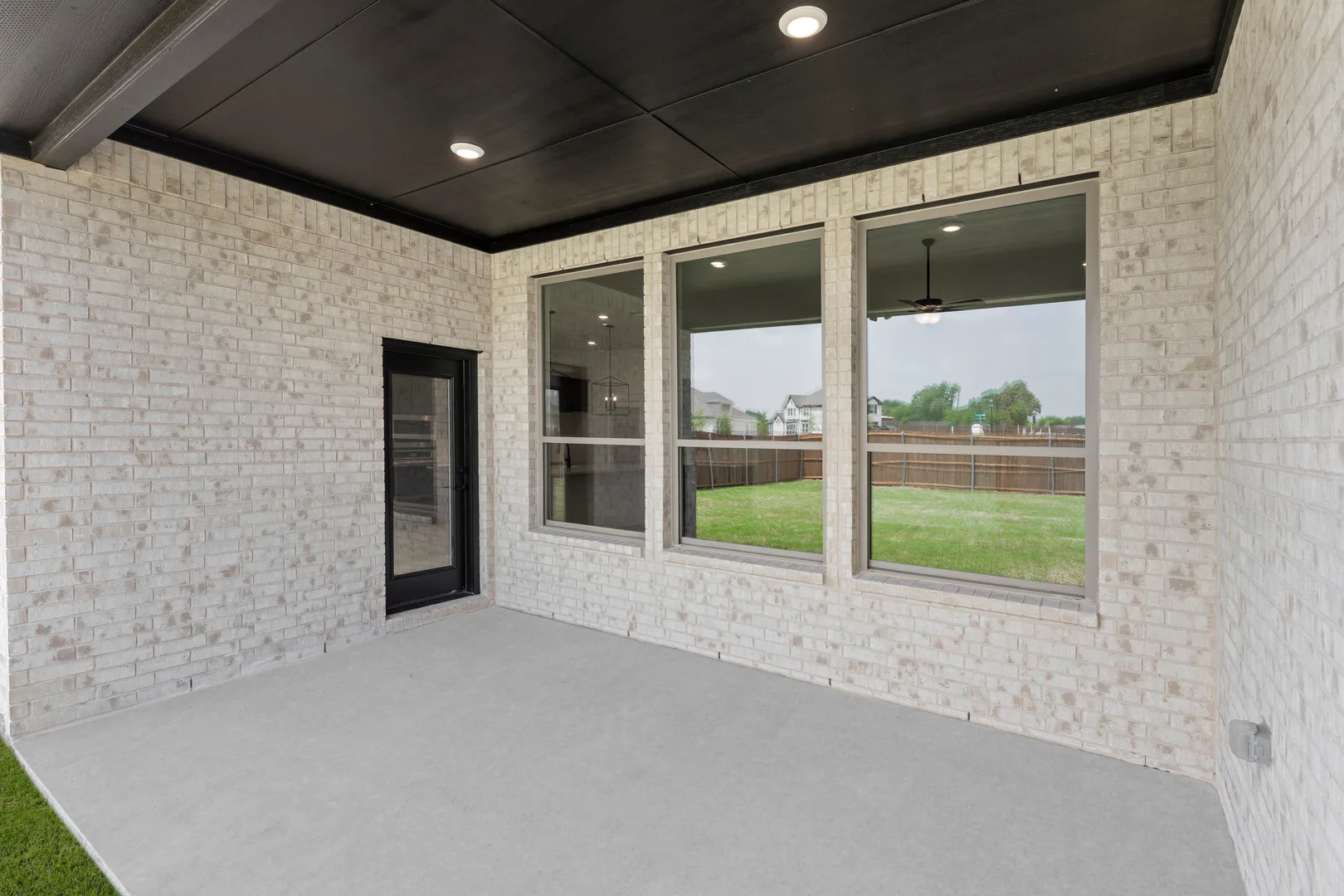 Covered patio in available home at Park Trails by Kindred Homes in Forney