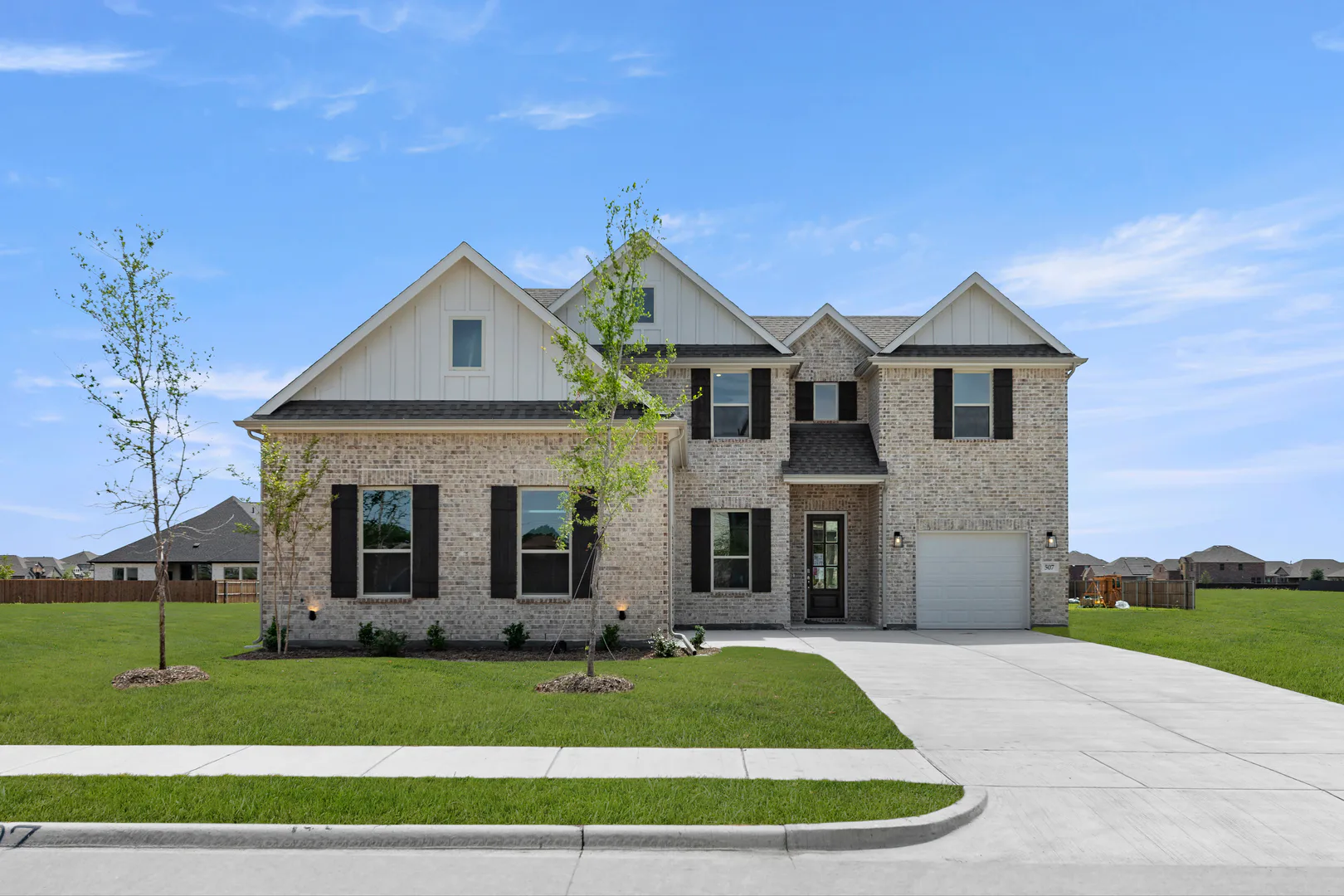 Exterior of a new home available at Park Trails by Kindred Homes in Forney