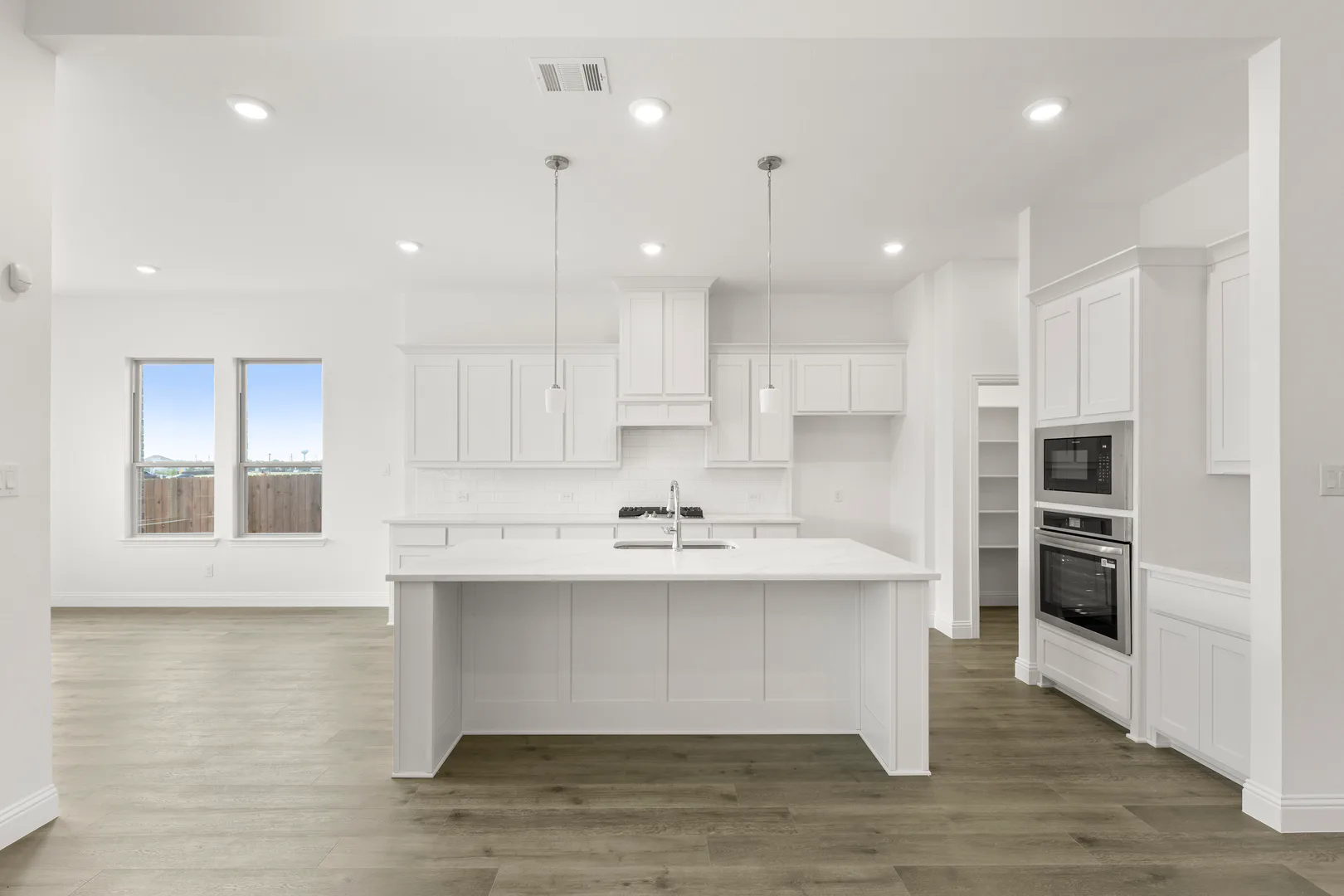 Kitchen in a new home available at Park Trails by Kindred Homes in Forney