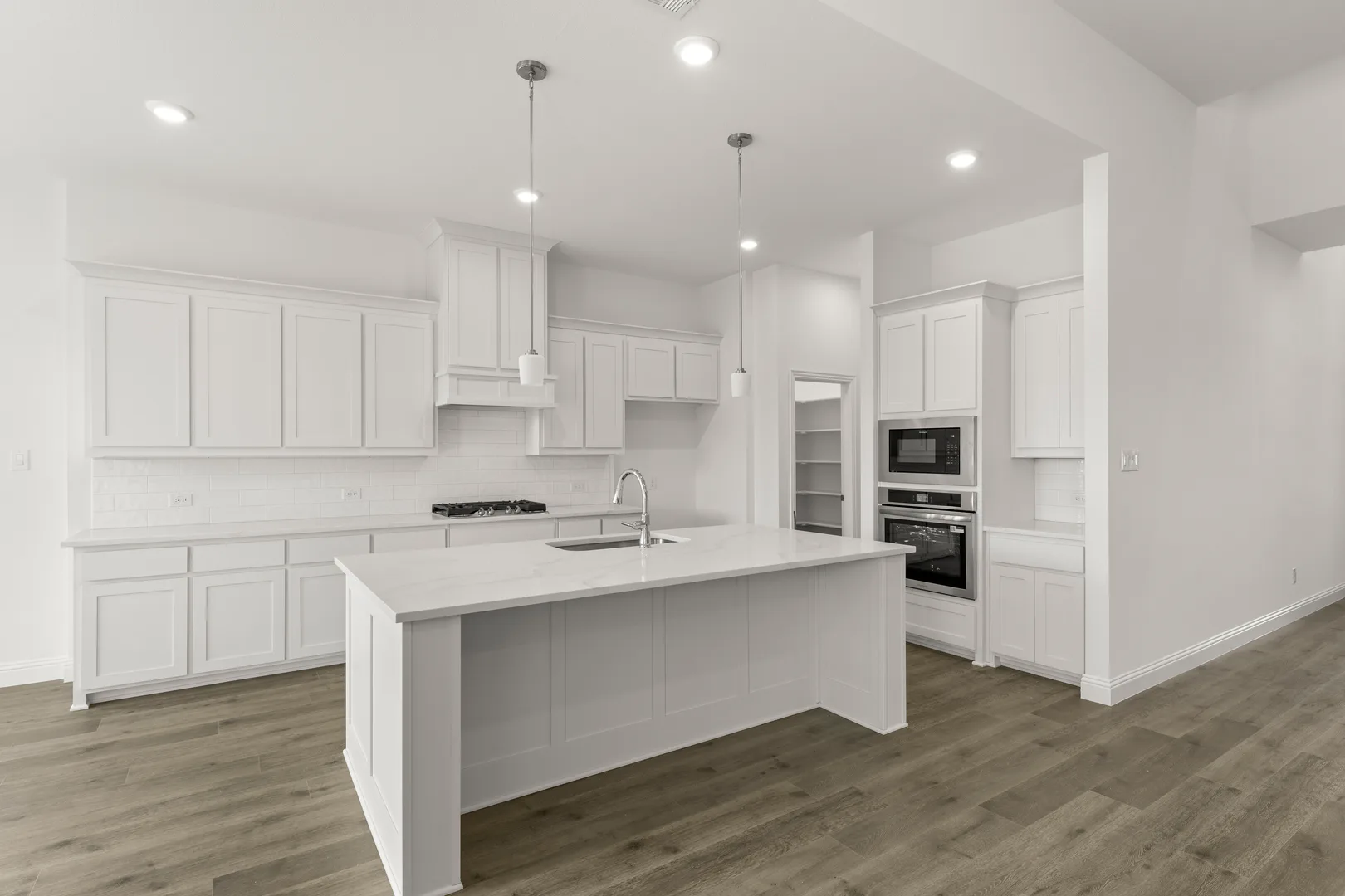 Kitchen in a new home available at Park Trails by Kindred Homes in Forney