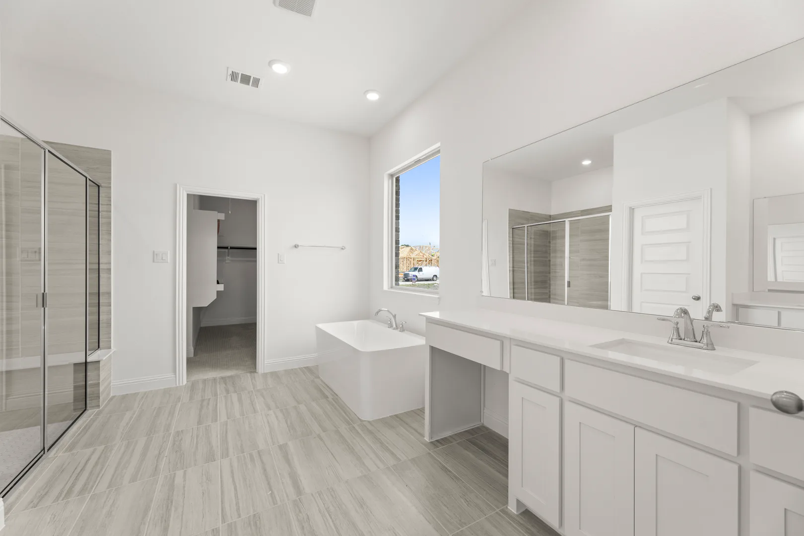 Primary bathroom in a new home available at Park Trails by Kindred Homes in Forney