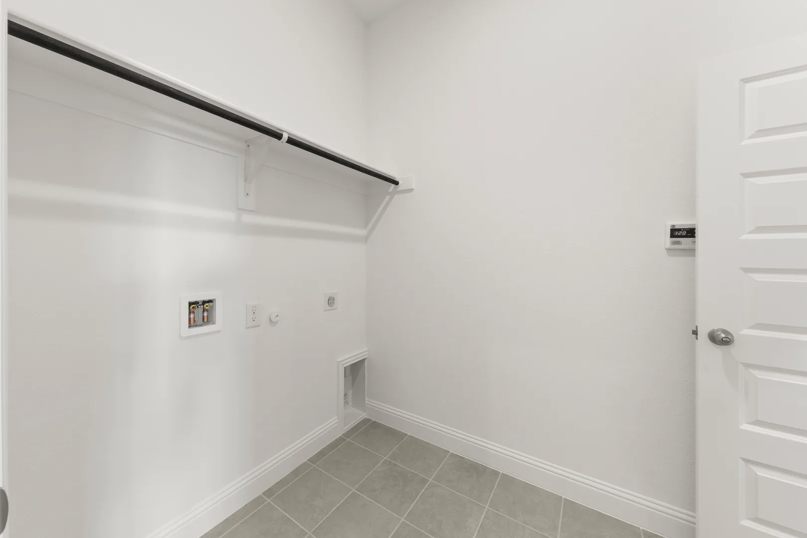 Utility room in a new home available at Park Trails by Kindred Homes in Forney